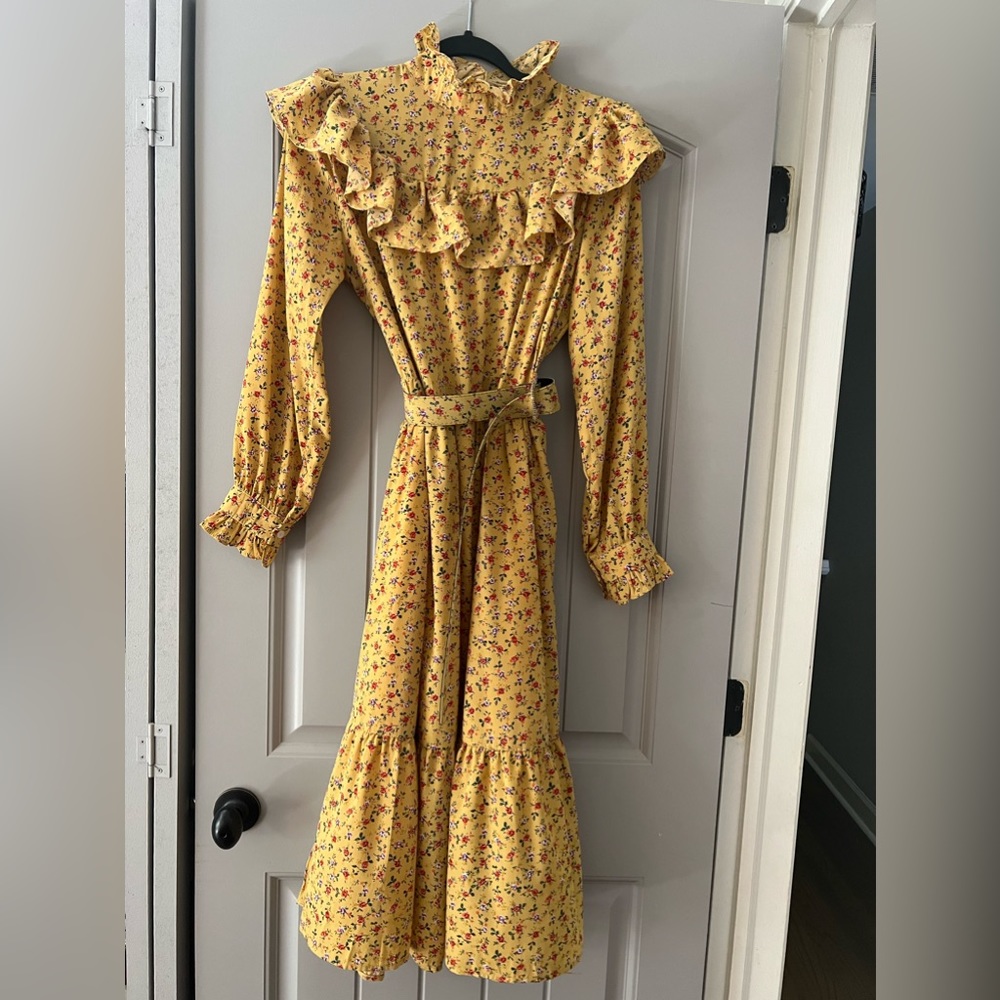 Yellow high neck and belted dress.